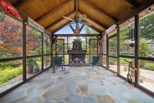 4205 N Narcissus Ave, Broken Arrow, OK 74012 - unfurnished sunroom with an outdoor stone fireplace and ceiling fan