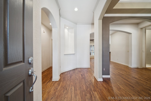 4205 N Narcissus Ave, Broken Arrow, OK 74012 - foyer with arched walkways, wood finished floors, crown molding, and recessed lighting
