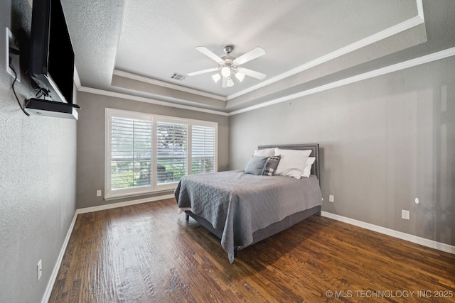 4205 N Narcissus Ave, Broken Arrow, OK 74012 - bedroom with a raised ceiling, ornamental molding, wood finished floors, and a ceiling fan