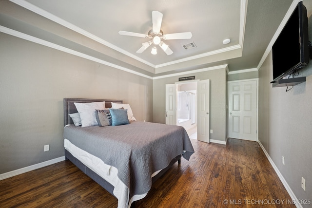 4205 N Narcissus Ave, Broken Arrow, OK 74012 - bedroom featuring a raised ceiling, wood finished floors, a ceiling fan, ornamental molding, and ensuite bathroom