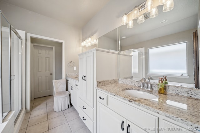 4205 N Narcissus Ave, Broken Arrow, OK 74012 - full bath featuring vanity, a stall shower, and tile patterned floors