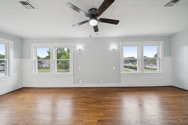 1601 E 6th St, Okmulgee, OK 74447 - empty room featuring crown molding, wood finished floors, and ceiling fan