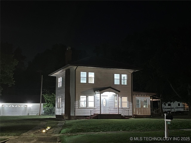 1601 E 6th St, Okmulgee, OK 74447 - view of front of property with a chimney and a yard