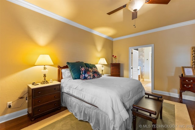 800 Magnolia, Ada, OK 74820 - bedroom with crown molding, connected bathroom, wood finished floors, and ceiling fan
