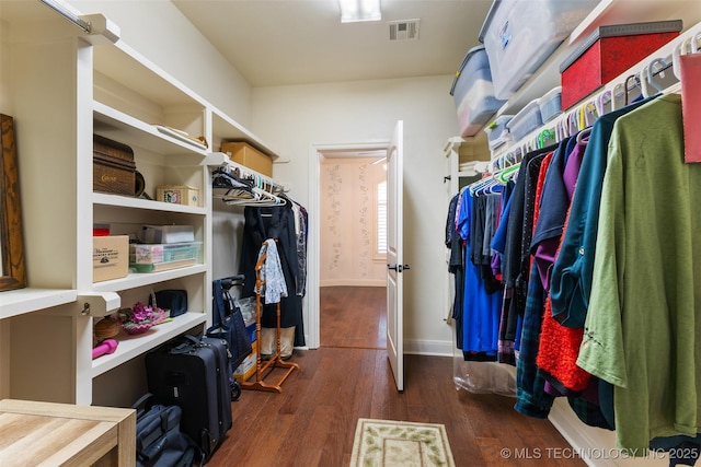 800 Magnolia, Ada, OK 74820 - walk in closet featuring dark wood-style flooring