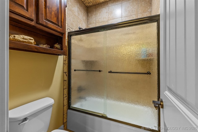 800 Magnolia, Ada, OK 74820 - bathroom with toilet and bath / shower combo with glass door
