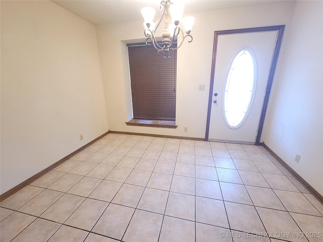 428101 E 1150th Rd, Porum, OK 74455 - entrance foyer featuring a chandelier and light tile patterned flooring