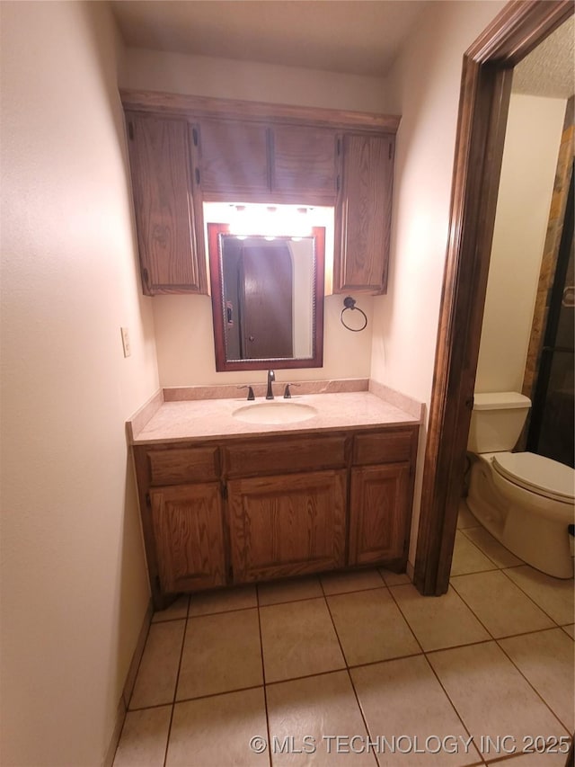 428101 E 1150th Rd, Porum, OK 74455 - bathroom with vanity and tile patterned floors