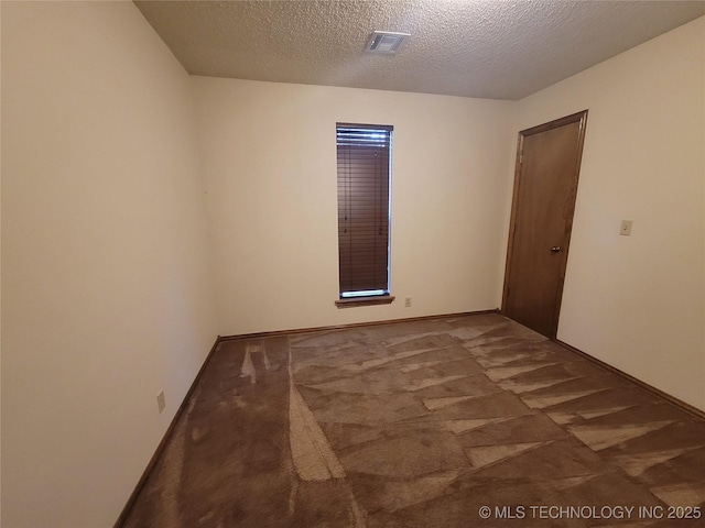 428101 E 1150th Rd, Porum, OK 74455 - unfurnished room with a textured ceiling