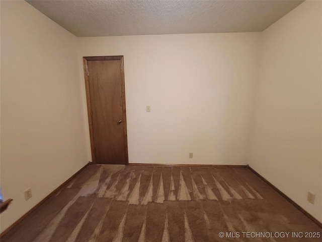 428101 E 1150th Rd, Porum, OK 74455 - carpeted empty room featuring baseboards