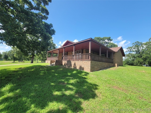 428101 E 1150th Rd, Porum, OK 74455 - view of property exterior with a yard