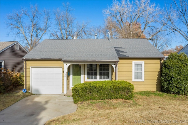 139 E 47th St, Tulsa, OK 74105 - view of front facade with a garage, driveway, roof with shingles, and a front lawn