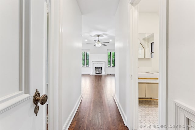 2605 S St Louis Ave, Tulsa, OK 74114 - hall with dark wood-style floors and baseboards