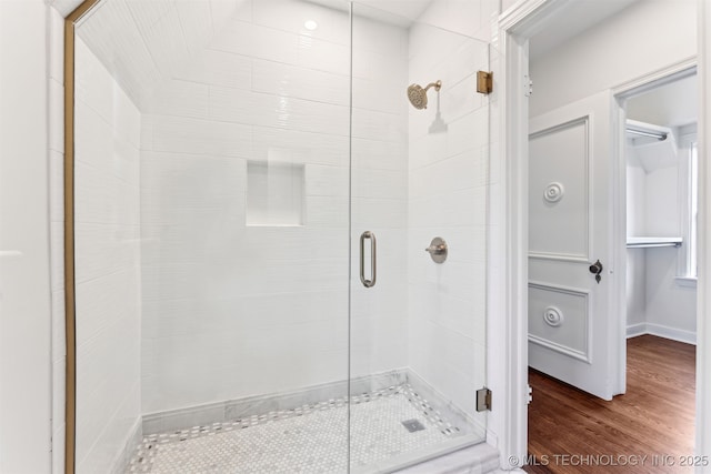 2605 S St Louis Ave, Tulsa, OK 74114 - full bathroom featuring a shower stall and wood finished floors