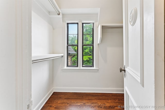 2605 S St Louis Ave, Tulsa, OK 74114 - walk in closet featuring dark wood-type flooring