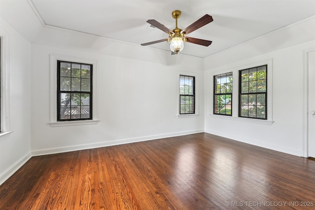 2605 S St Louis Ave, Tulsa, OK 74114 - spare room featuring healthy amount of natural light, dark wood-style flooring, ceiling fan, and ornamental molding