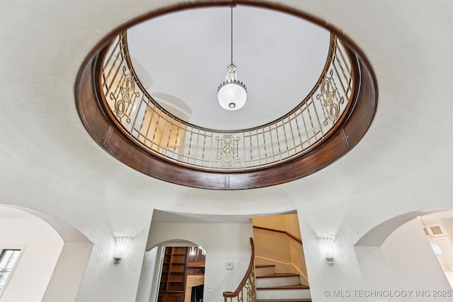 2605 S St Louis Ave, Tulsa, OK 74114 - detailed view of arched walkways and a textured wall