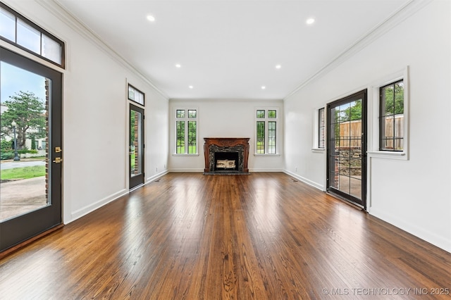 2605 S St Louis Ave, Tulsa, OK 74114 - unfurnished living room featuring dark wood-style flooring, ornamental molding, a high end fireplace, and recessed lighting