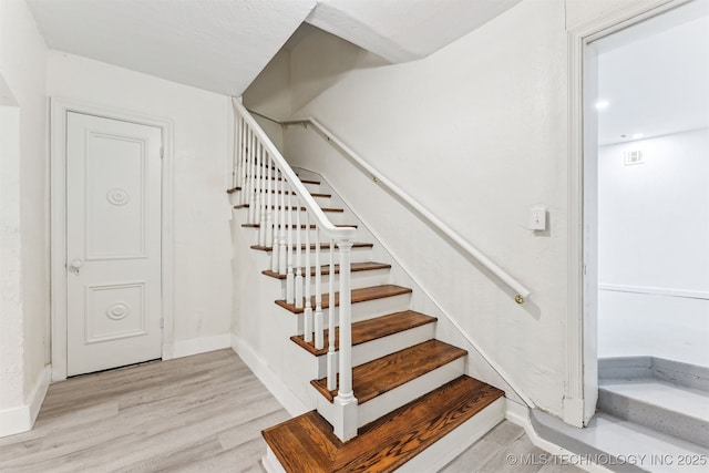 2605 S St Louis Ave, Tulsa, OK 74114 - staircase featuring wood finished floors and baseboards