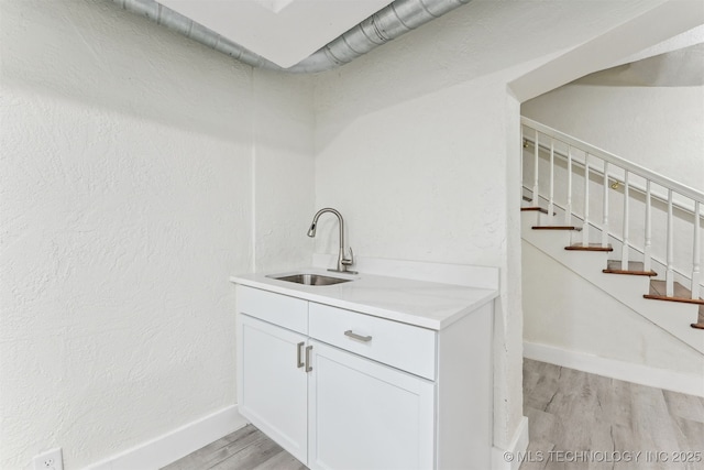 2605 S St Louis Ave, Tulsa, OK 74114 - bar featuring light wood finished floors and stairway