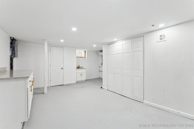 2605 S St Louis Ave, Tulsa, OK 74114 - finished basement featuring recessed lighting and baseboards