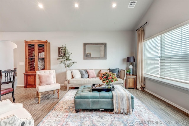 1914 W Imperial St, Broken Arrow, OK 74011 - living area with wood finished floors, arched walkways, and recessed lighting