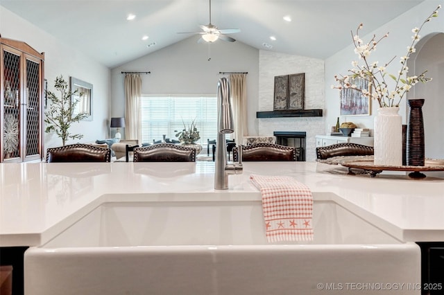 1914 W Imperial St, Broken Arrow, OK 74011 - detailed view of ceiling fan, a stone fireplace, recessed lighting, and light countertops