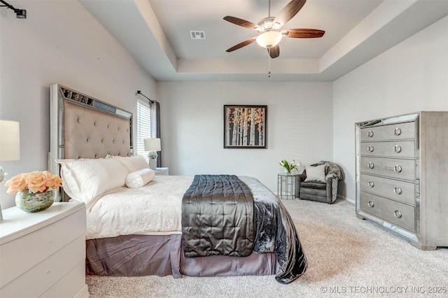 1914 W Imperial St, Broken Arrow, OK 74011 - bedroom featuring a raised ceiling, carpet flooring, and ceiling fan