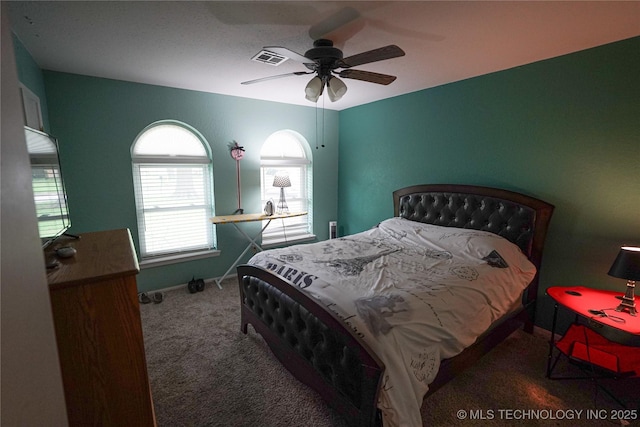 2613 Turner St, Muskogee, OK 74403 - carpeted bedroom with baseboards and a ceiling fan