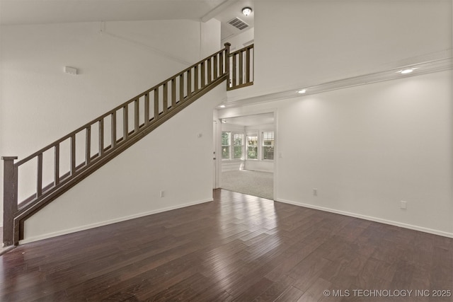 5117 S Lions Ave, Broken Arrow, OK 74011 - unfurnished living room featuring high vaulted ceiling, stairs, and wood finished floors