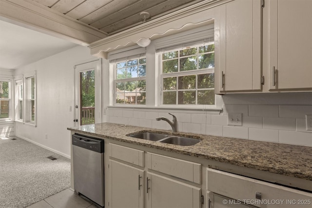 5117 S Lions Ave, Broken Arrow, OK 74011 - kitchen featuring stainless steel dishwasher, backsplash, carpet flooring, and light stone countertops