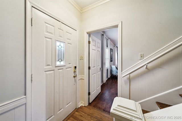 1210 E 15th St, Ada, OK 74820 - foyer with dark wood-style floors, ornamental molding, and plenty of natural light