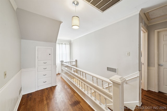 1210 E 15th St, Ada, OK 74820 - hall featuring an upstairs landing, wood finished floors, a wainscoted wall, and attic access