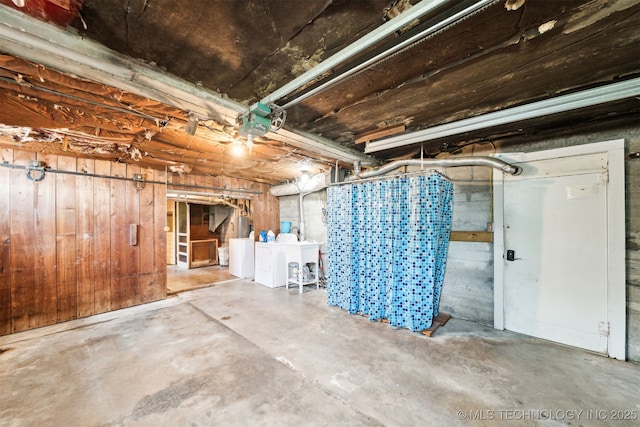 1210 E 15th St, Ada, OK 74820 - unfinished basement with wood walls