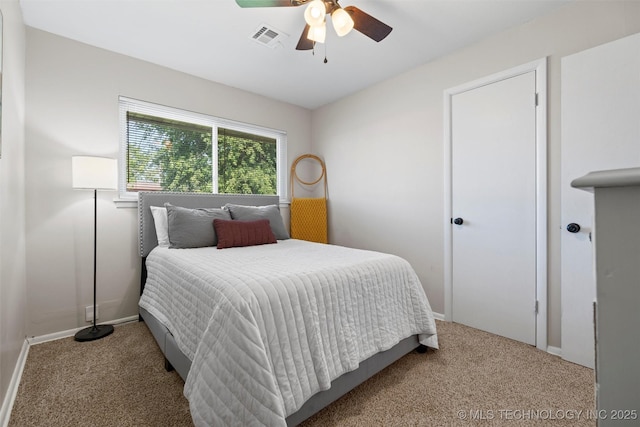 321 NE Elmhurst Ave, Bartlesville, OK 74006 - carpeted bedroom with baseboards and ceiling fan