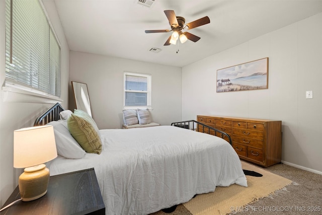 321 NE Elmhurst Ave, Bartlesville, OK 74006 - bedroom with carpet flooring and a ceiling fan