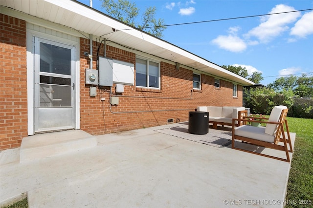 321 NE Elmhurst Ave, Bartlesville, OK 74006 - view of patio with an outdoor hangout area