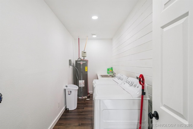 19471 E 335th Rd, Chelsea, OK 74016 - laundry area with washing machine and dryer, electric water heater, dark wood-style flooring, and recessed lighting
