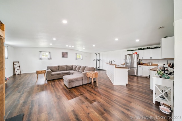 19471 E 335th Rd, Chelsea, OK 74016 - living area with recessed lighting, dark wood-style floors, and vaulted ceiling
