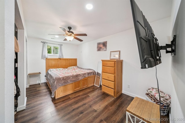 19471 E 335th Rd, Chelsea, OK 74016 - bedroom with dark wood-style floors, recessed lighting, and ceiling fan