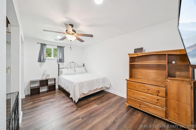 19471 E 335th Rd, Chelsea, OK 74016 - bedroom with dark wood-style flooring, ceiling fan, and recessed lighting