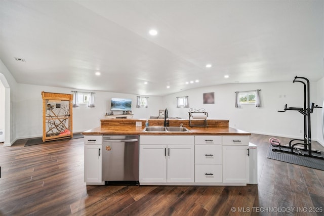 19471 E 335th Rd, Chelsea, OK 74016 - kitchen with stainless steel dishwasher, butcher block counters, recessed lighting, dark wood finished floors, and lofted ceiling