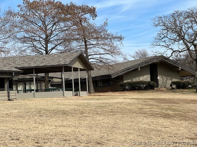 9 Arrowhead, Burneyville, OK 73430 - view of side of home with a yard