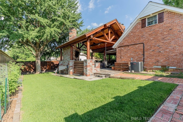 3107 E 84th St, Tulsa, OK 74137 - view of yard with a ceiling fan and a patio