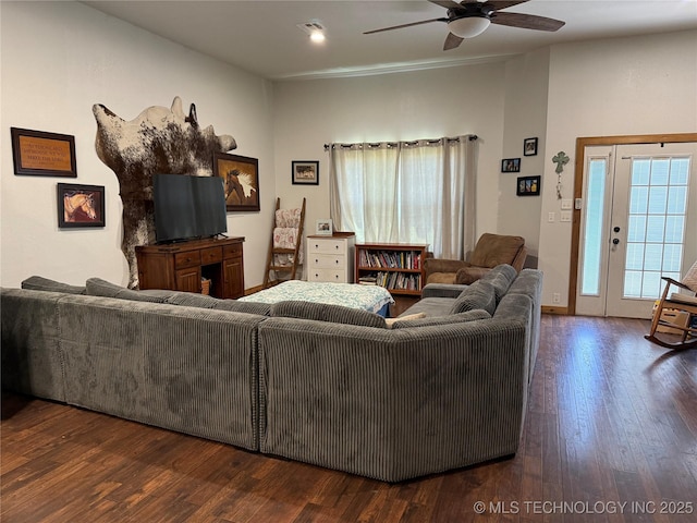 13560 S 4150th Rd, Claremore, OK 74017 - living room featuring a ceiling fan and dark wood-style floors