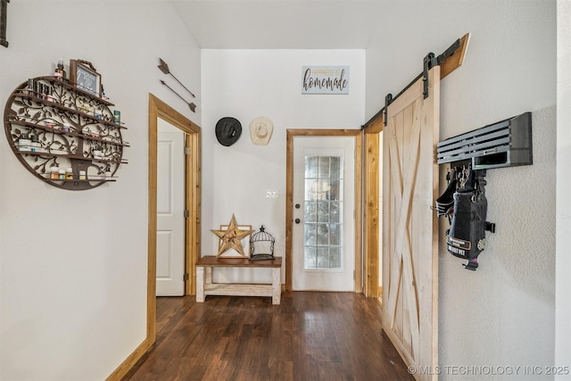 13560 S 4150th Rd, Claremore, OK 74017 - entryway with dark wood-type flooring and a barn door