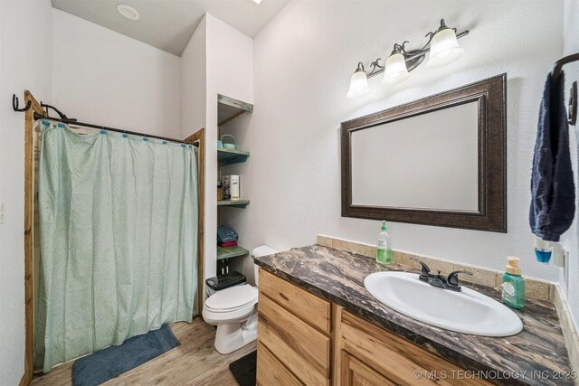 13560 S 4150th Rd, Claremore, OK 74017 - bathroom with vanity and wood finished floors