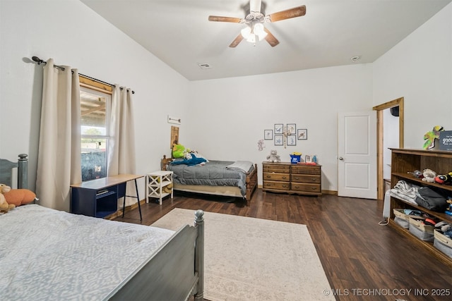 13560 S 4150th Rd, Claremore, OK 74017 - bedroom with vaulted ceiling, dark wood-style flooring, and ceiling fan