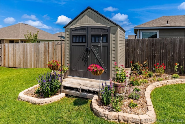 11042 N 120th Ave E, Owasso, OK 74055 - view of shed with a fenced backyard