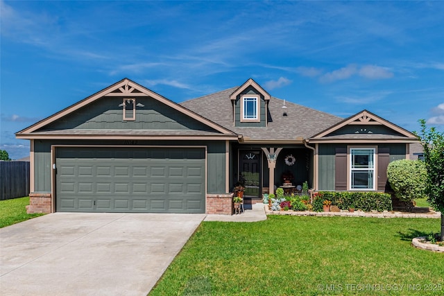 11042 N 120th Ave E, Owasso, OK 74055 - view of front of home featuring driveway, an attached garage, a shingled roof, and brick siding